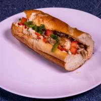Chicken Philly Cheesesteak · Mozzarella cheese, bell pepper and onions served with fries.