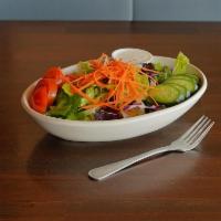 9. Green Salad · Mixed greens, roma lettuce, roma tomatoes, persian cucumber and carrots with house dressing.