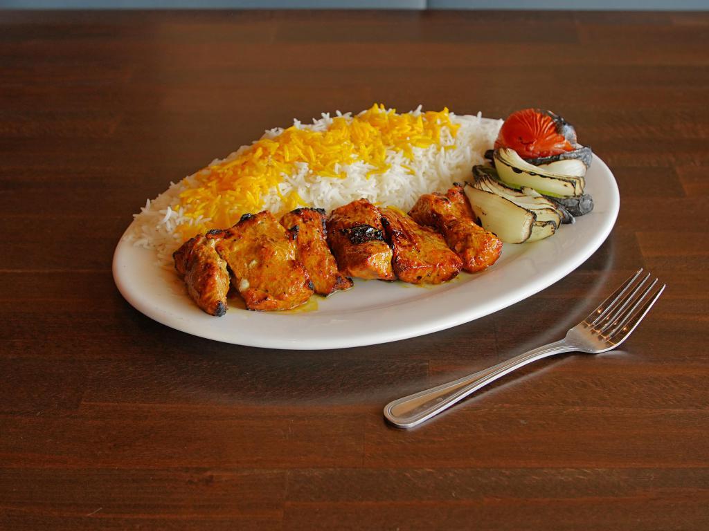 26. Shish Kabob · All natural beef. Succulent chunks of filet mignon marinated and grilled with bell peppers and onions. Served with steamed basmati rice and BBQ tomato.