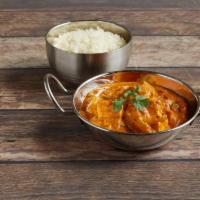 Paneer Tikka Masala · Indian homemade cheese cooked in masala sauce with sliced onions, ginger, tomatoes, and bell...