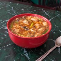 24. Hot and Sour Soup · With fried noodles.