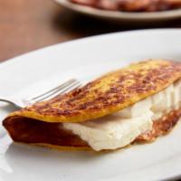 Cachapa · A delightful pancake made with sweet tender corn with guayanes cheese.
