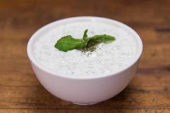 Cucumber Salad · Cucumber, yogurt, garlic and topped with dry mint.