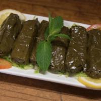 Grape Leaves · A vegetarian appetizer stuffed with rice, tomato, onions, parsley and home made seasoning.
