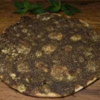 Zaatar Pie · Dried thyme, sumac, sesame seeds, with olive oil and veggie oil.