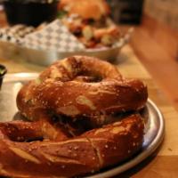 Pretzel with Beer Cheese · 1 giant German style pretzel served hot with our house-made beer cheese sauce. Add beer chee...