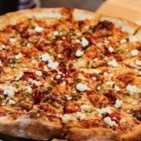 Hot Mess Pizza · Spicy red sauce, sopressata, in-house pickled peppers, goat cheese and honey.