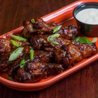 Portobello Wings · 8 Jumbo wings fried to perfect crisp and tossed in your choice of roasted garlic lime sauce,...