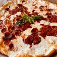 The Ultimate Pepperoni Pie · A Classic Margarita Pie Smothered with Layers of Fresh Mozzarella & Sliced Pepperoni Cups