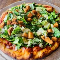 Caesar Salad Pie · A Fresh Tomato Basil Sauce Topped with Crisp Romain Lettuce Coated in Our Creamy Caesar Dres...