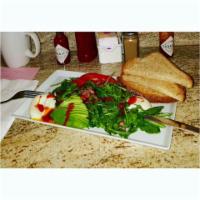 Breakfast Salad · Organic baby arugula tossed with sauteed Canadian bacon, red onions, fresh lemon vinaigrette...