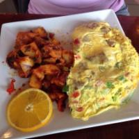 California Omelette · Sauteed onions, bell peppers and Jack and cheddar cheese.