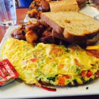 Sausage Omelette · Onions, bell peppers and chicken sausage.