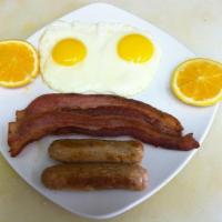 Breakfast Combo · Eggs any style, 2 strips of mesquite bacon and two sausages. Served with home style potatoes...