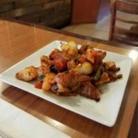 Home Style Potatoes · With green onions, bell peppers and house seasoning.