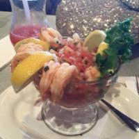 Cocktail de Camarones · Delicious steamed shrimps marinated with tomato, lemon juice, diced cucumber, onions and pic...