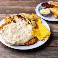 11 oz. Texas Country Fried Steak · Served with gravy, 2 country fresh eggs, hash brown potatoes, toast and jelly.