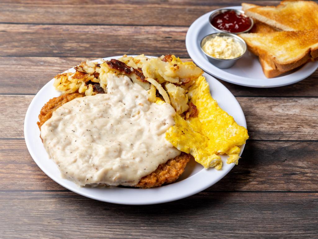 11 oz. Texas Country Fried Steak · Served with gravy, 2 country fresh eggs, hash brown potatoes, toast and jelly.