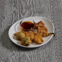 5 Pieces Vegetable Tempura · Assorted vegetables dipped in a light and flaky Japanese batter and deep fried.