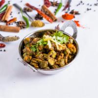 Bhindi Masala · Baby okra sauteed with onions, tomatoes and spices.