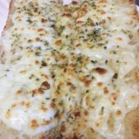 Garlic Bread with Cheese · Comes with a side of pizza sauce.