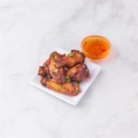 Chicken Wings · Deep fried marinated chicken served w/sweet & sour sauce.