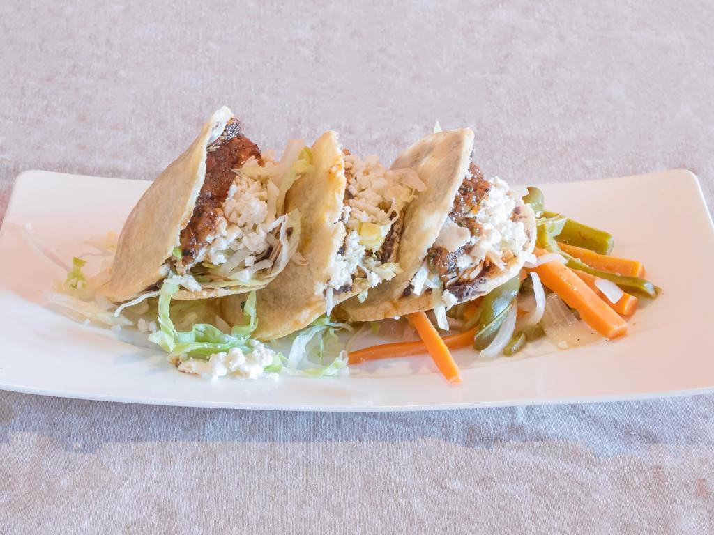3 Gorditas · Three crispy masa cake filled, carnitas, cactus or chicken with lettuce, topped with salsa, queso fresco served with escabeche.
