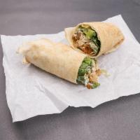 Chicken Caesar Wrap · Roasted chicken, croutons, Parmesan cheese and Caesar dressing tossed with romaine lettuce s...