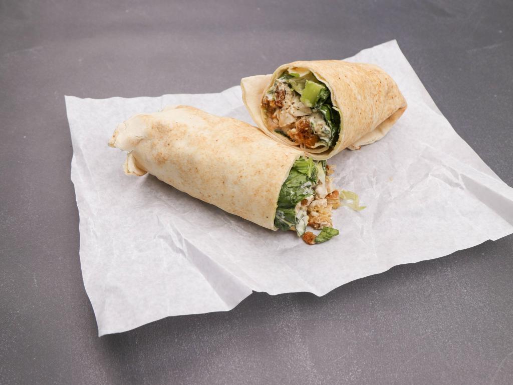 Chicken Caesar Wrap · Roasted chicken, croutons, Parmesan cheese and Caesar dressing tossed with romaine lettuce served on a pita.