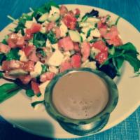 Mediterranean Salad · Cucumbers, tomatoes, olives, feta cheese, basil and olive oil. Lettuce, tomato, onions and b...
