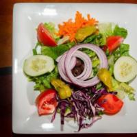 House Salad · Romaine lettuce with red cabbage, carrots, cucumbers, Kalamata olives, pepperoncinis, tomato...