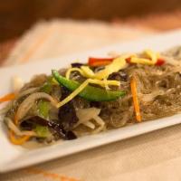 Japchae Noodles · Sweet potato glass noodles sautèed with spinach, carrots, and ear mushrooms Vegetarian. Glut...