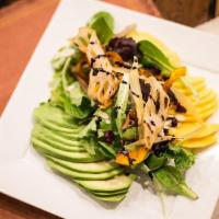 Avocado Mango Salad · Mixed greens, avocado and mango with pineapple-corn dressing, topped with sunflower seeds an...