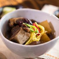 Braised Short Ribs · Beef short ribs braised with daikon radish, bell peppers, and topped with scallion. Served w...