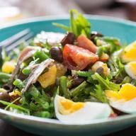 Nicoise Salad · Lettuce, tuna, egg, tomatoes, red onion, beans and black olives.