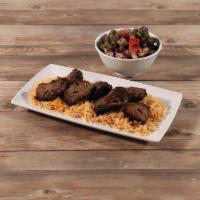 Beef Kofta Kabob · Seasoned ground beef on a skewer, char-broiled. Served with grilled vegetables and rice.