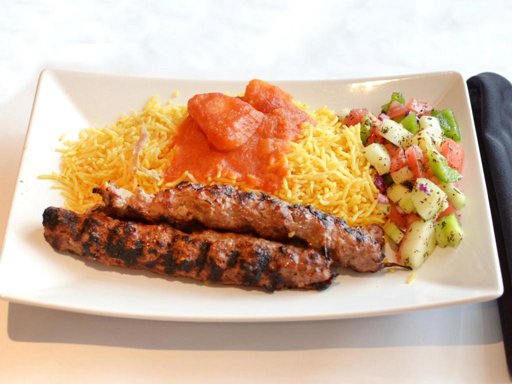 Beef Teka Kabob · Skewered chunks of sirloin beef char-broiled with fresh tomatoes, onions and bell peppers. Served with rice.