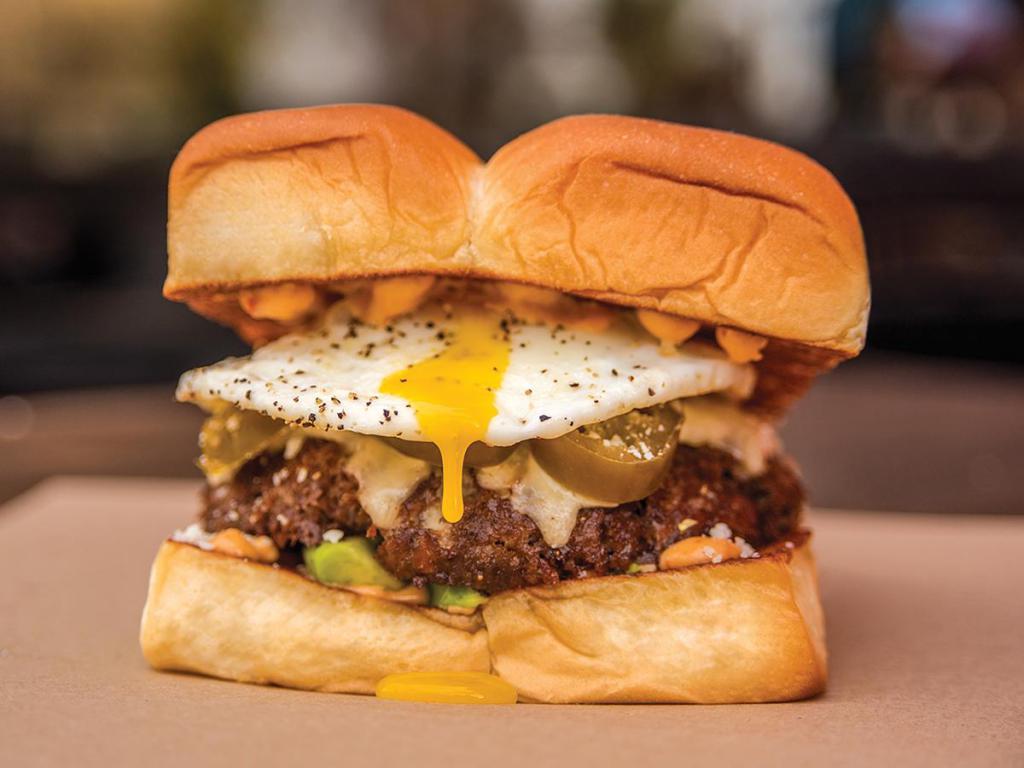 Little Mule · White American cheese, avocado, pickled jalapenos, Cotija cheese, fried egg, and chipotle aioli. Hormone and antibiotic free beef served on King's Hawaiian roll.