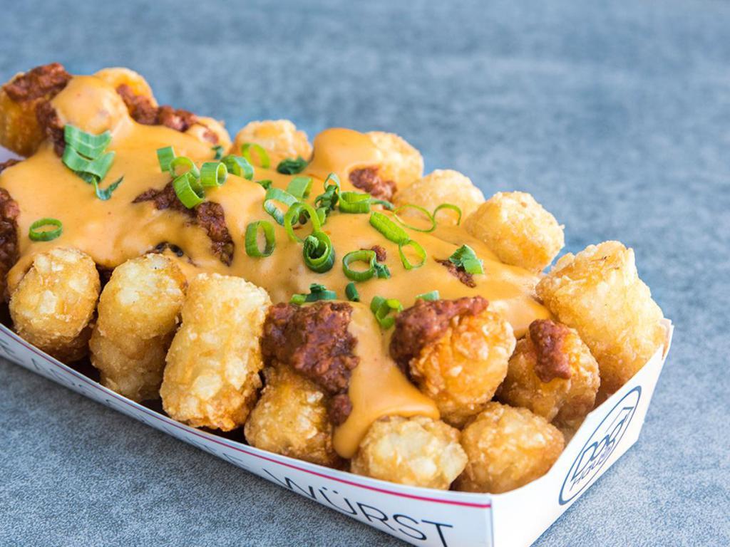 Chili Cheese Tots · With Green scallions.