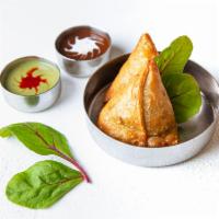 Samosa (2) · Triangular fried pastry with a savory filling of spiced vegetables or minced Lamb