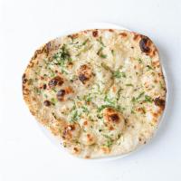 Garlic Naan · Indian flatbread flavored with garlic & butter
