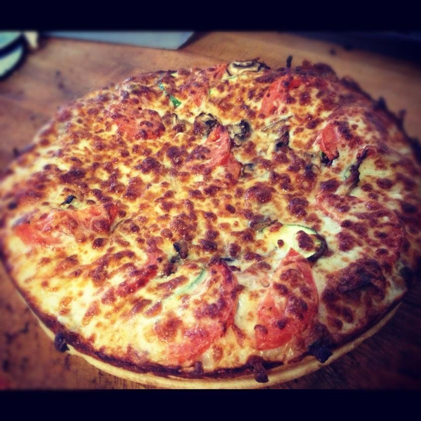 Vivacious Vegetarian Pizza · Big Tomato sauce, tomatoes, red onions, mushrooms, bell peppers & mozzarella cheese. Vegetarian.