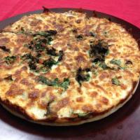 Sinful Spinach Pizza · Big Tomato sauce, fresh garlic, spinach, mozzarella & parmesan cheese. Vegetarian.