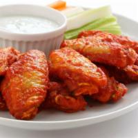 Chicken Wings · Choice of sauce served with celery & dipping sauce.