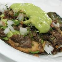 Asada Tacos · 3 street style tacos. Asada, guacamole, and pico de gallo.