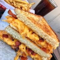 Bacon Grilled Cheese w/ side of fries · Bacon and 3 cheeses with Texas toast.  served with side of fries