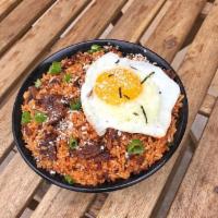Joint Fried Rice Bowl · Korean beef, kimchi, onions, spicy aioli and egg sunny side up. 
