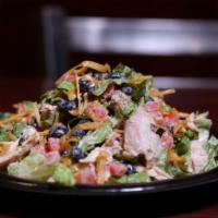 Carali's Salad · Pulled rotisserie chicken, romaine lettuce, diced tomatoes, black beans, tortilla strips and...