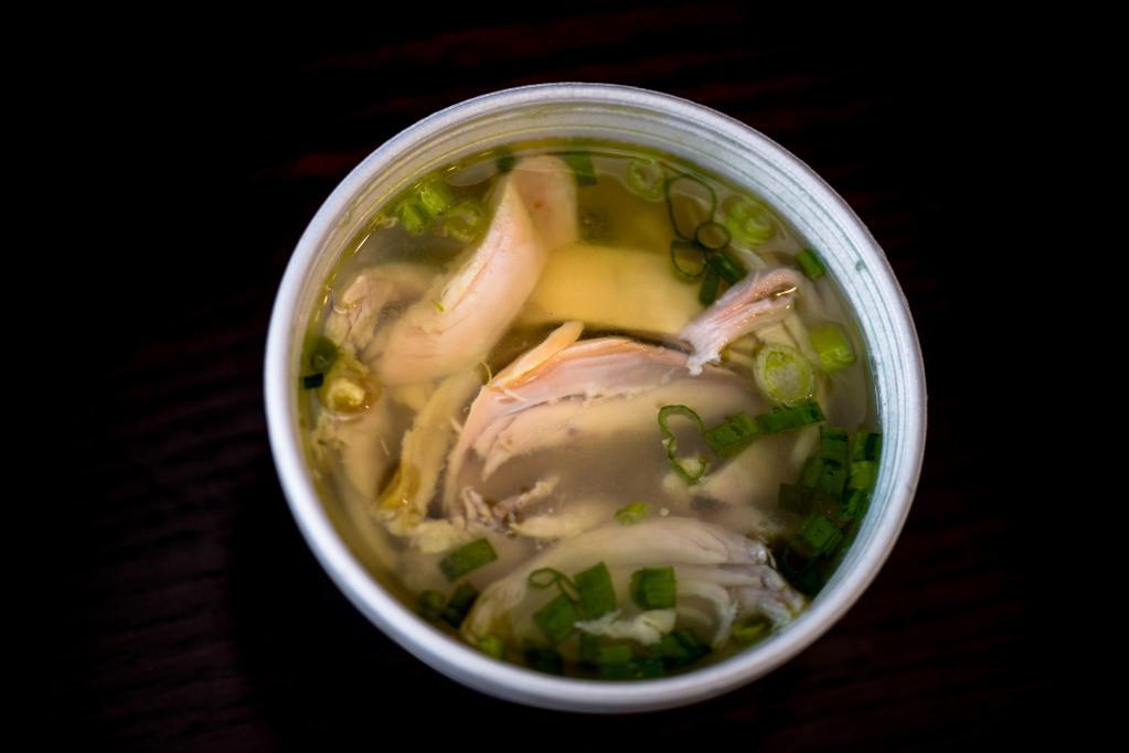Chicken Soup · Shredded rotisserie chicken, rice, herb and spices.