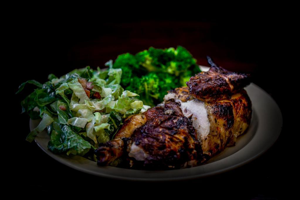 1/2 Chicken with 2 Sides · All natural chicken, marinated in our Peruvian; spices and cooked to golden perfection in our custom charcoal rotisserie ovens.